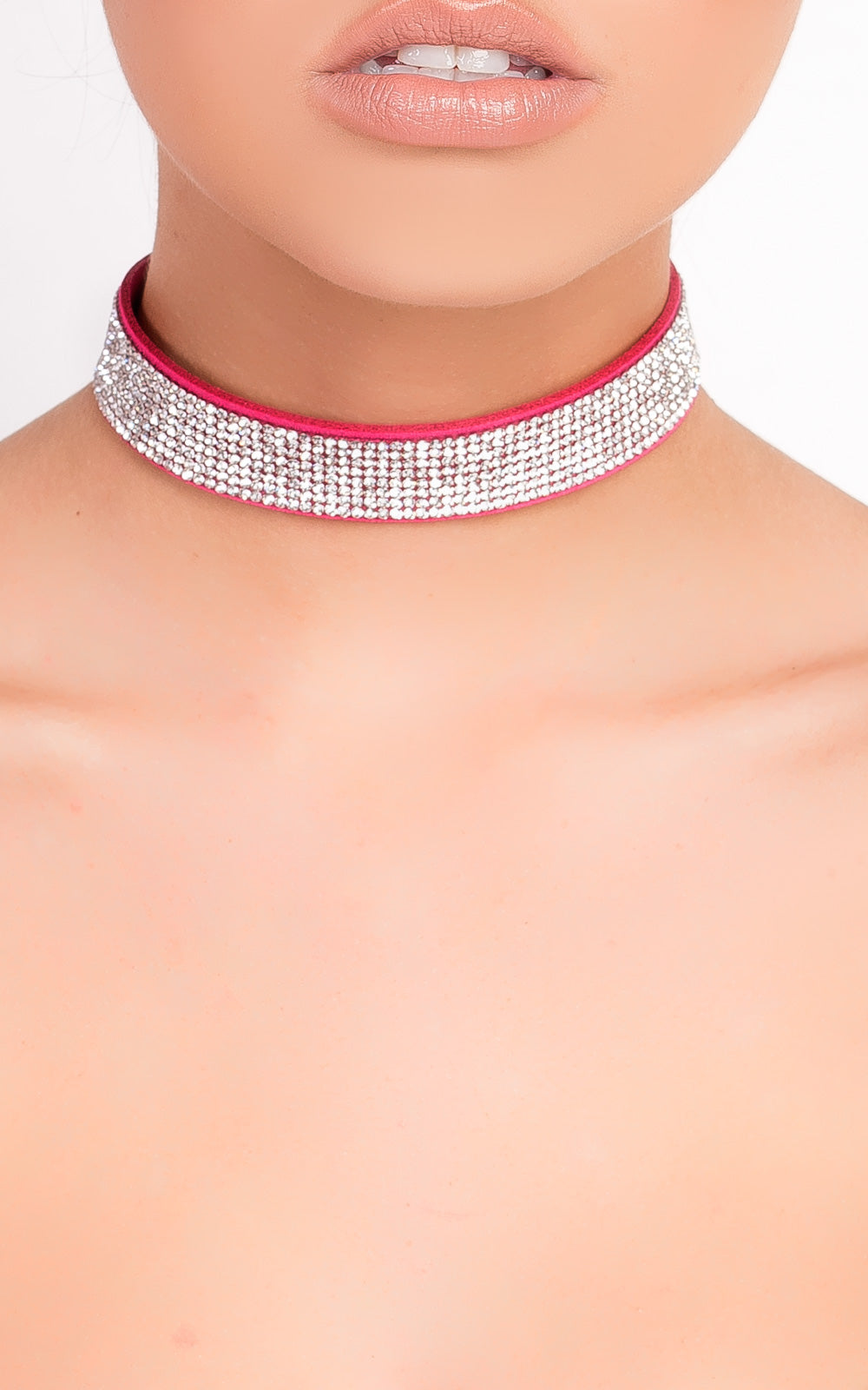 Suede Diamante Choker by Clarizzma featuring sparkling rhinestones on a soft suede band. A glamorous accessory perfect for evening wear and special occasions.