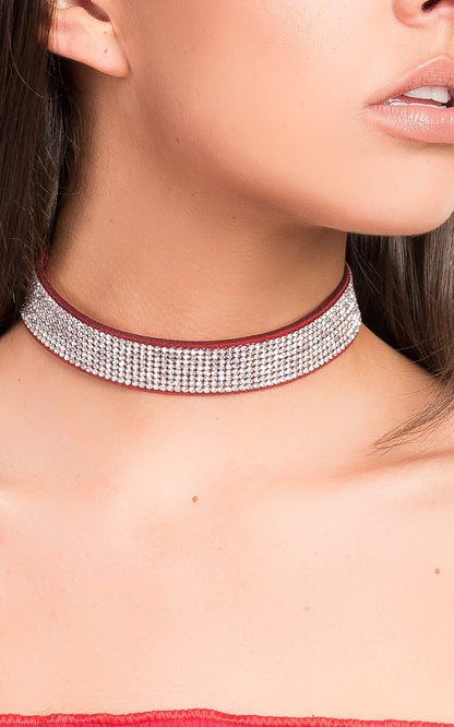 Suede Diamante Choker by Clarizzma, featuring sparkling rhinestones on a soft suede band. A glamorous accessory perfect for evening wear.